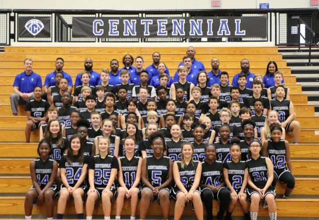 Full Centennial Jr. Knights program group photo on the home court
